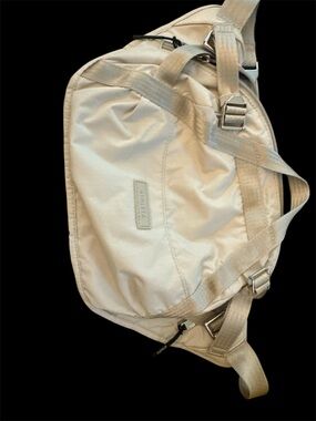 Athleta Cream Excursion Crossbody bag with Metal Buckles